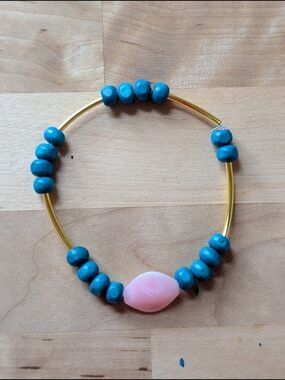Handcrafted Blue Bead Stretch Bracelet with Pink Accent